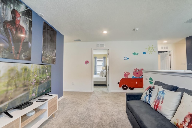 living room featuring visible vents, baseboards, and carpet