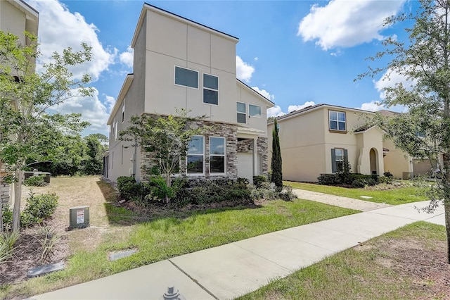 view of front of property with a front lawn