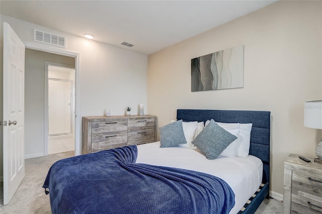 bedroom with visible vents, baseboards, and carpet flooring