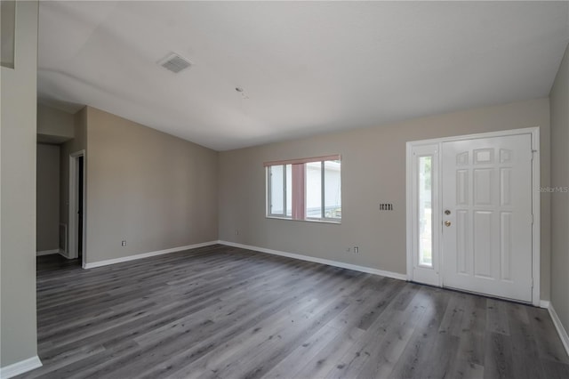 foyer entrance featuring hardwood / wood-style floors