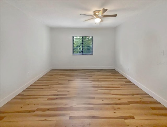 unfurnished room with ceiling fan and light hardwood / wood-style floors