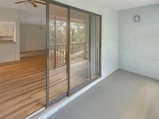 interior space featuring ceiling fan