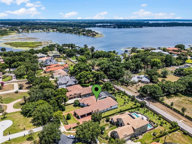 drone / aerial view with a water view