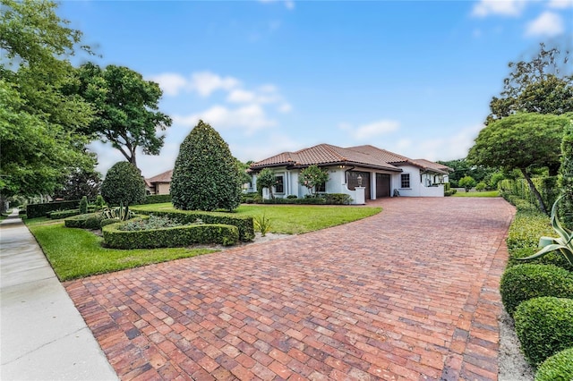 view of front of property with a front lawn