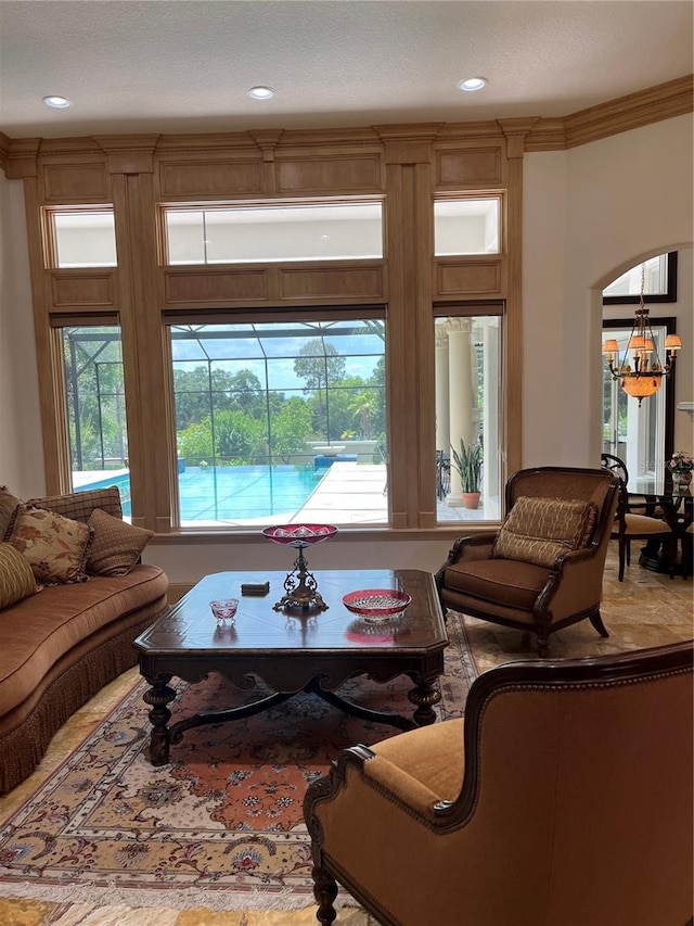 living room featuring crown molding