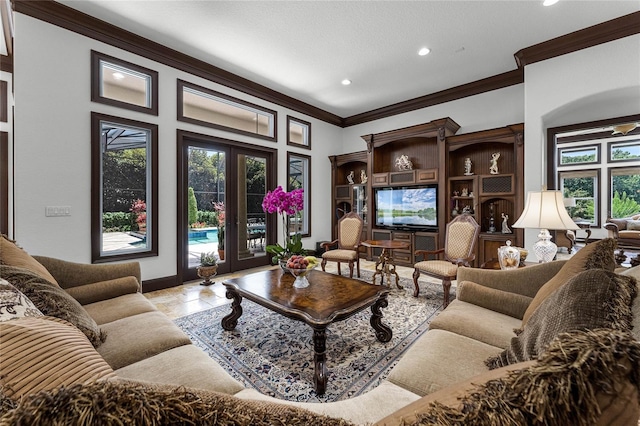 living room with ornamental molding and french doors