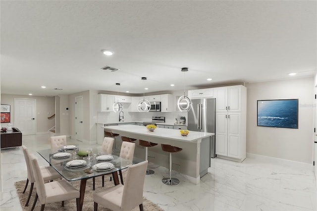 dining area with sink