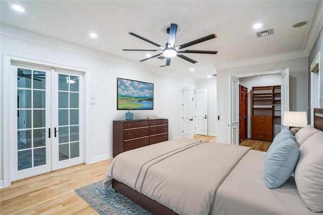 bedroom with access to exterior, visible vents, ornamental molding, and light wood finished floors