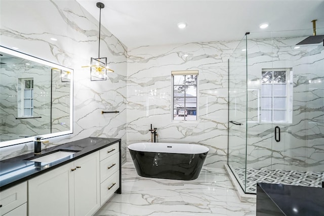 bathroom featuring a marble finish shower and stone wall