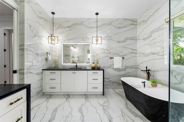 full bathroom with stone wall, a soaking tub, vanity, and marble finish floor