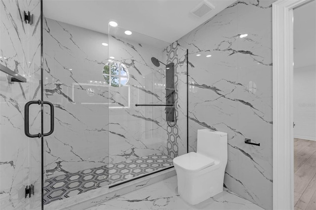 bathroom with visible vents, marble finish floor, stone wall, a marble finish shower, and toilet