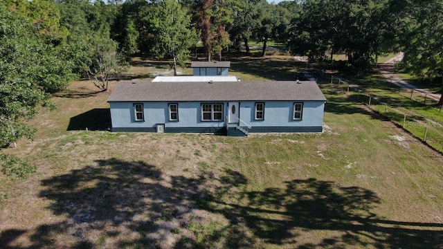 exterior space with a front yard