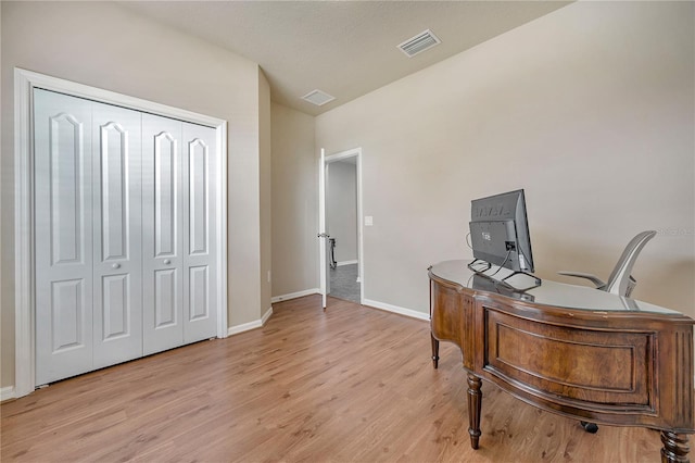 office space featuring light hardwood / wood-style floors