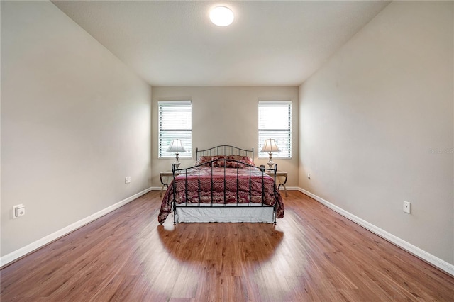 bedroom featuring hardwood / wood-style floors