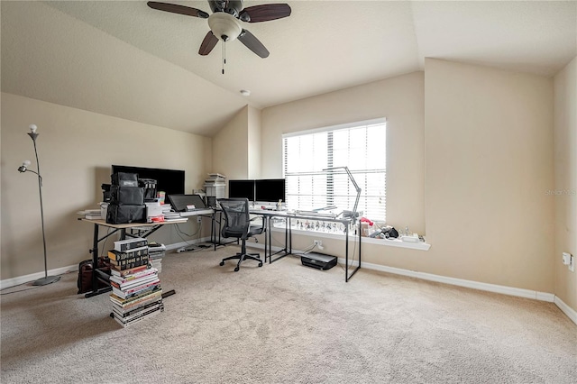 office featuring ceiling fan, light carpet, and lofted ceiling