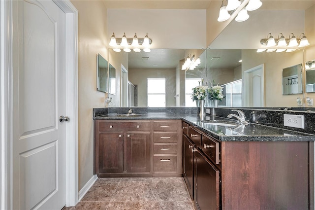 bathroom with vanity and an enclosed shower