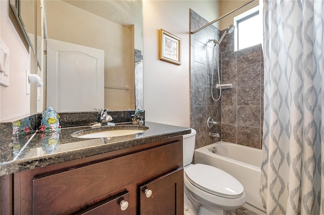 full bathroom featuring vanity, toilet, and shower / bath combo