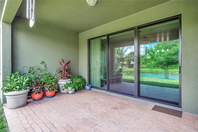 doorway to property featuring a patio