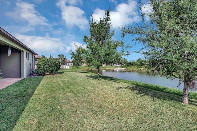 view of yard with a water view