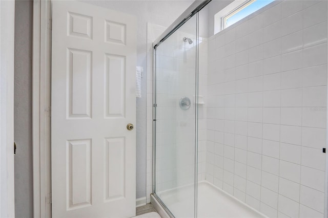 bathroom with an enclosed shower