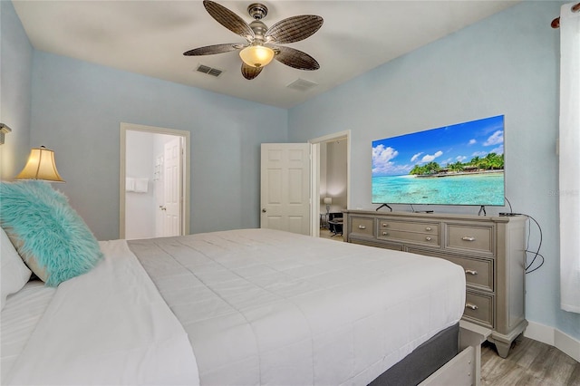 bedroom featuring ceiling fan and light wood-type flooring