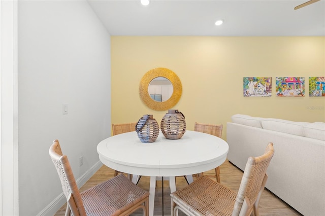 dining area featuring light wood-type flooring