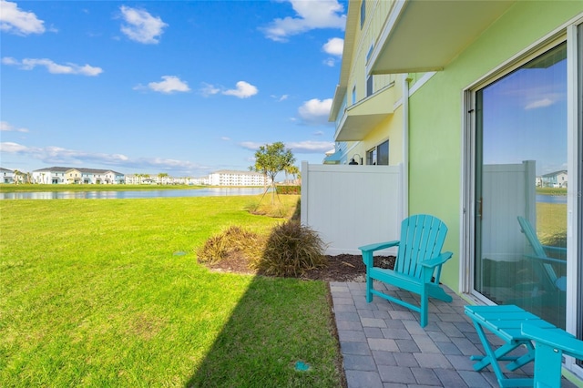 view of yard with a water view