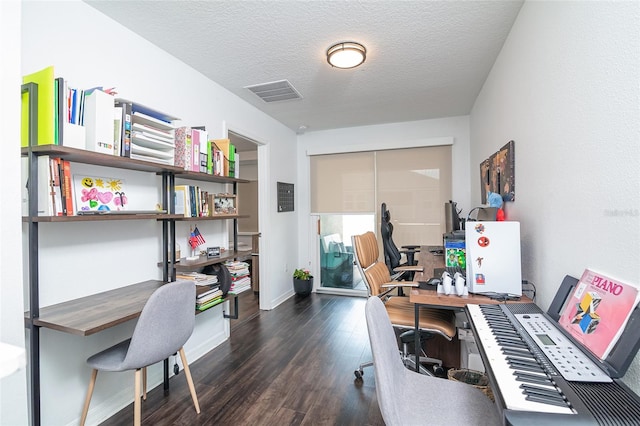 office space with dark hardwood / wood-style flooring and a textured ceiling