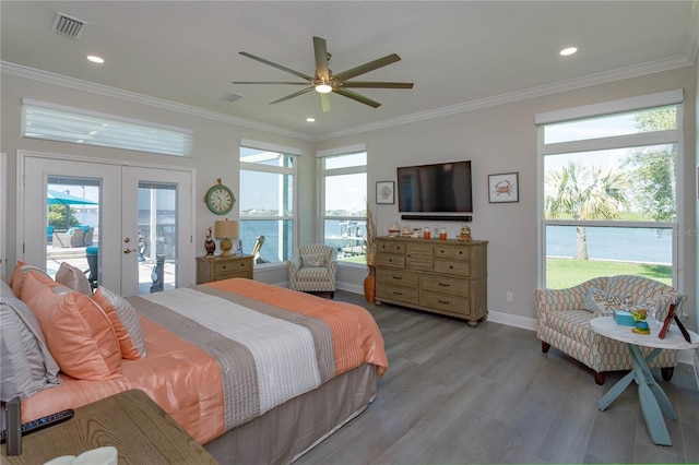 bedroom featuring french doors, access to outside, ceiling fan, crown molding, and light hardwood / wood-style flooring