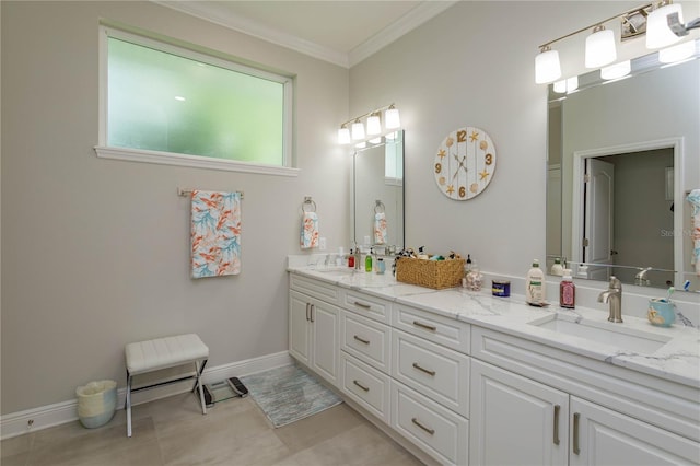 full bathroom with crown molding, double vanity, and baseboards