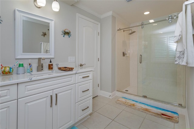 full bath with a stall shower, ornamental molding, vanity, tile patterned floors, and recessed lighting