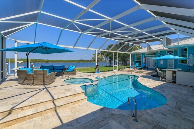 view of swimming pool featuring outdoor lounge area, a patio, a pool with connected hot tub, and glass enclosure