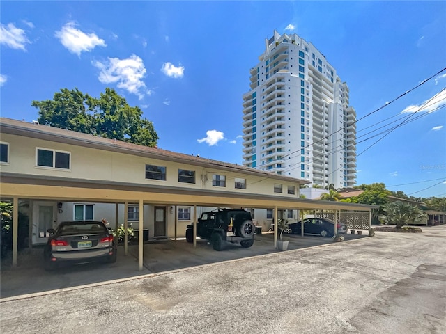 view of car parking featuring a carport