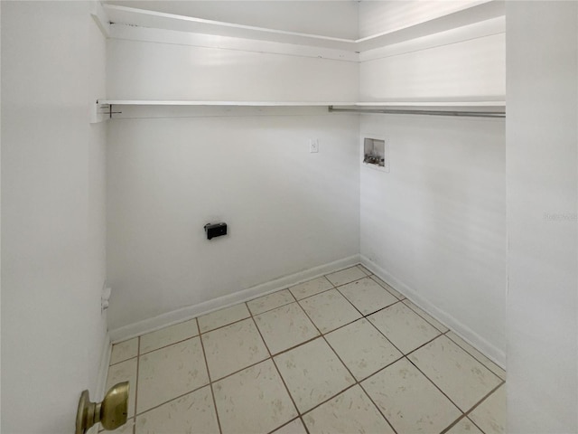 laundry area featuring washer hookup and tile patterned floors