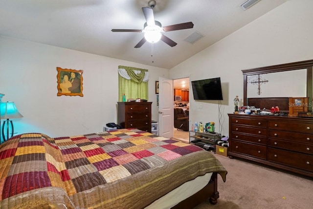 carpeted bedroom with ceiling fan, ensuite bath, and lofted ceiling