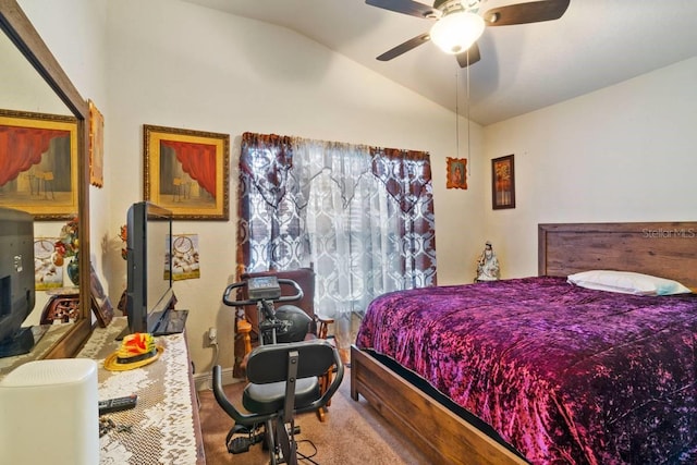 bedroom with ceiling fan, carpet, and vaulted ceiling