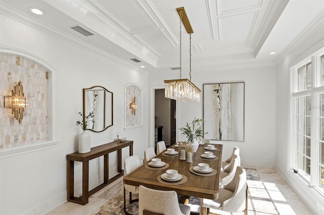 dining space with visible vents, a raised ceiling, crown molding, and baseboards