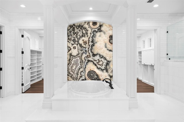 9832 Laurel Valley Dr, Windermere, FL 34786 - bathroom featuring a spacious closet, a bath, ornate columns, recessed lighting, and ornamental molding