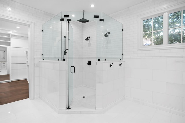 9832 Laurel Valley Dr, Windermere, FL 34786 - bathroom featuring a shower stall, recessed lighting, and a walk in closet