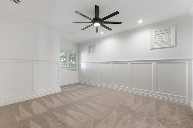 9832 Laurel Valley Dr, Windermere, FL 34786 - spare room with a decorative wall, ornamental molding, carpet floors, a ceiling fan, and recessed lighting