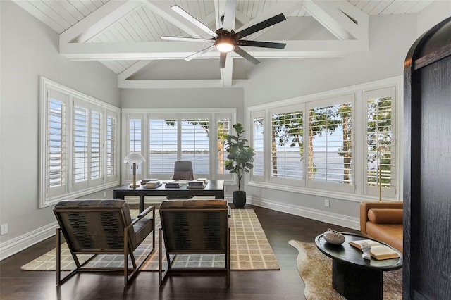 office featuring beamed ceiling, high vaulted ceiling, a ceiling fan, dark wood-style floors, and baseboards