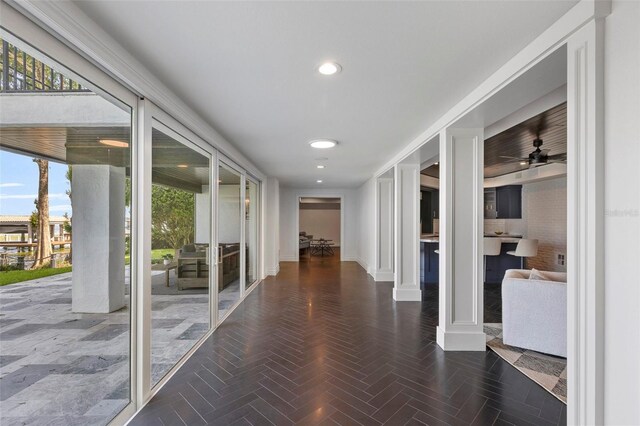 9832 Laurel Valley Dr, Windermere, FL 34786 - hallway with healthy amount of natural light and recessed lighting