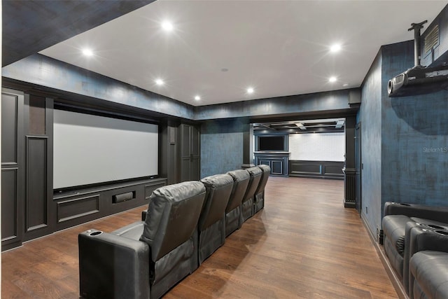 9832 Laurel Valley Dr, Windermere, FL 34786 - cinema with dark wood-style flooring, recessed lighting, and a decorative wall