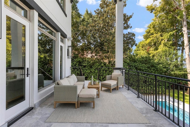 balcony with an outdoor hangout area