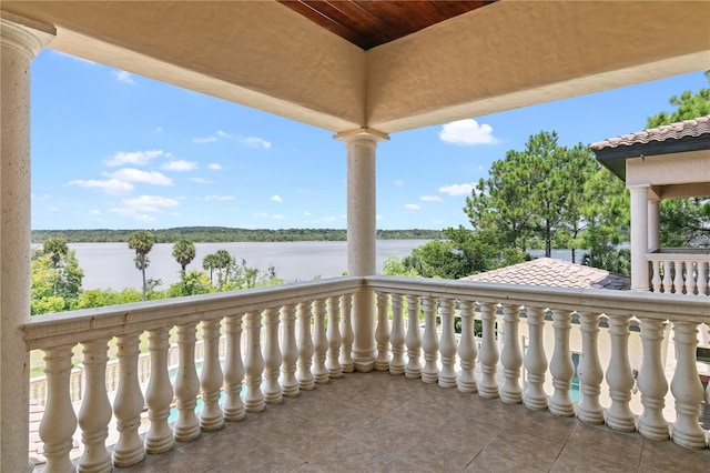 balcony featuring a water view