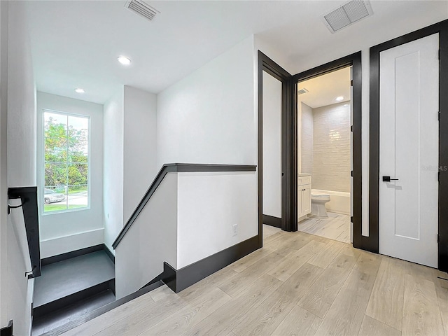 hall featuring light hardwood / wood-style flooring