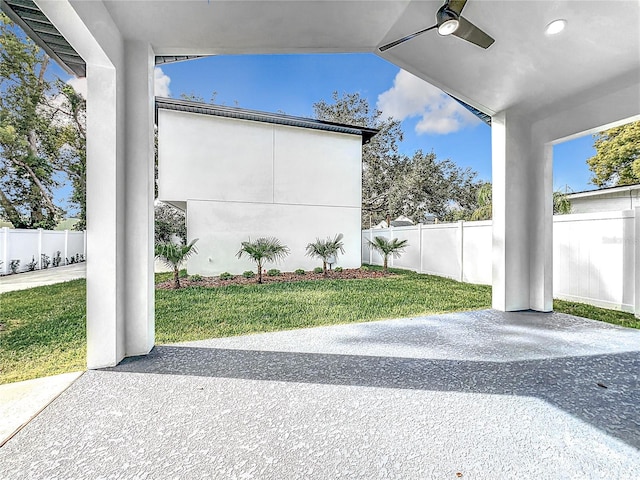 view of patio with ceiling fan