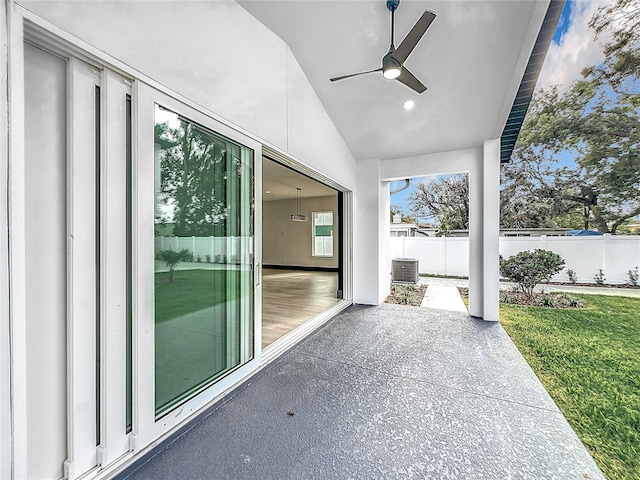 view of patio with ceiling fan and cooling unit