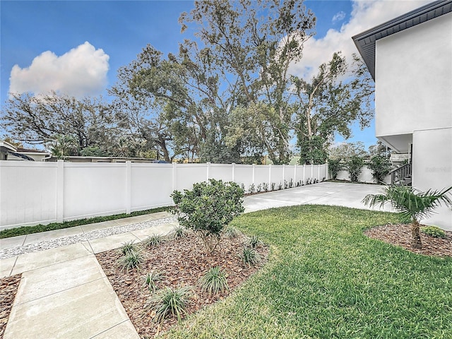 view of yard with a patio area