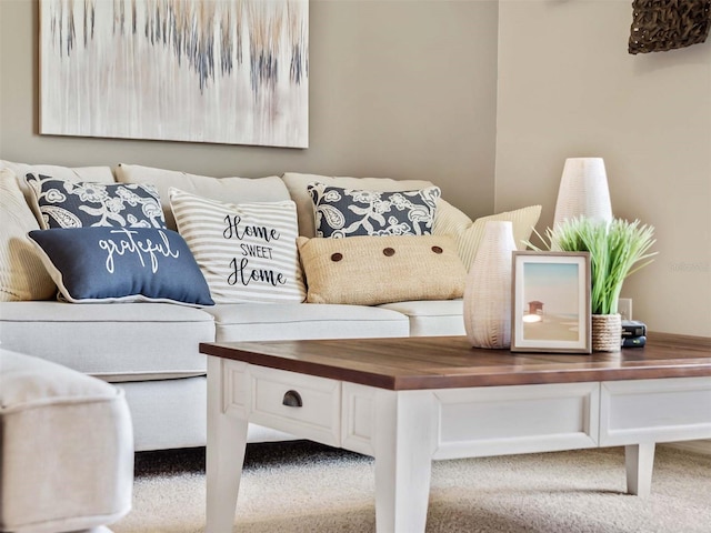 sitting room featuring carpet floors